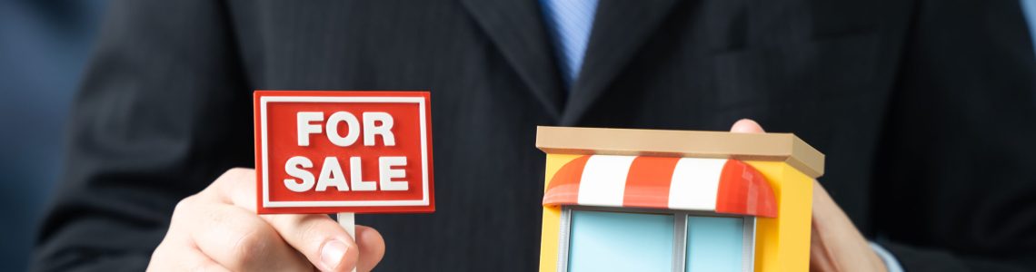 Listing a business for sale. A realtor helps sell a store. Business exit strategy, asset valuation and deal facilitation. Entrepreneurship transition, investor interest